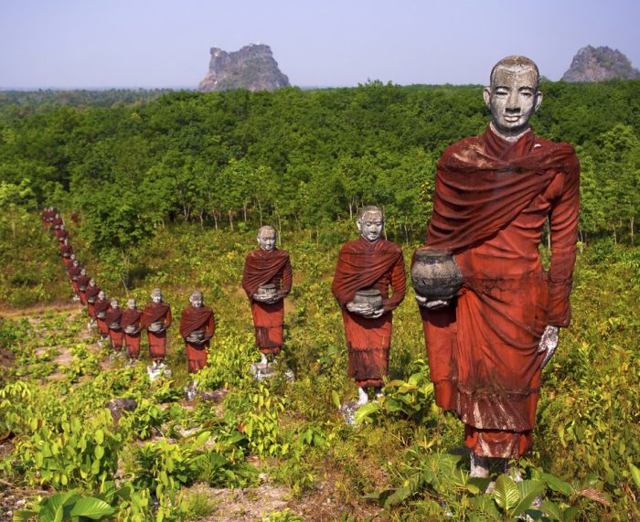 Statues of Buddhist monks near Win Sein Taw Ya, Mawlamyine